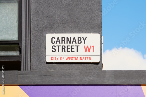 Carnaby street sign, famous shopping street in London photo
