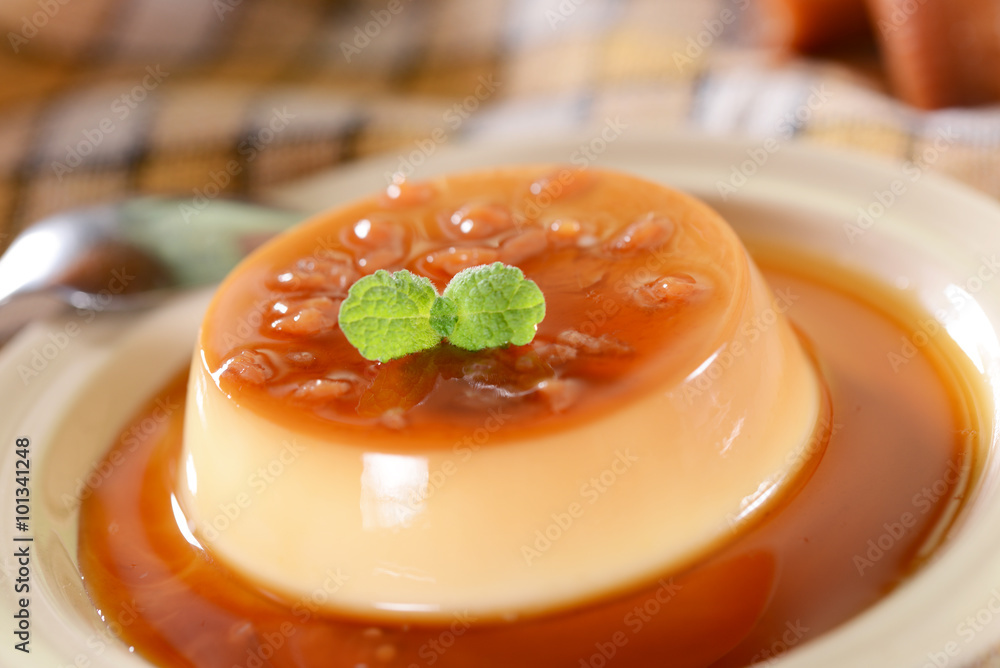 Fotografie Panna cotta dessert with caramel sauce