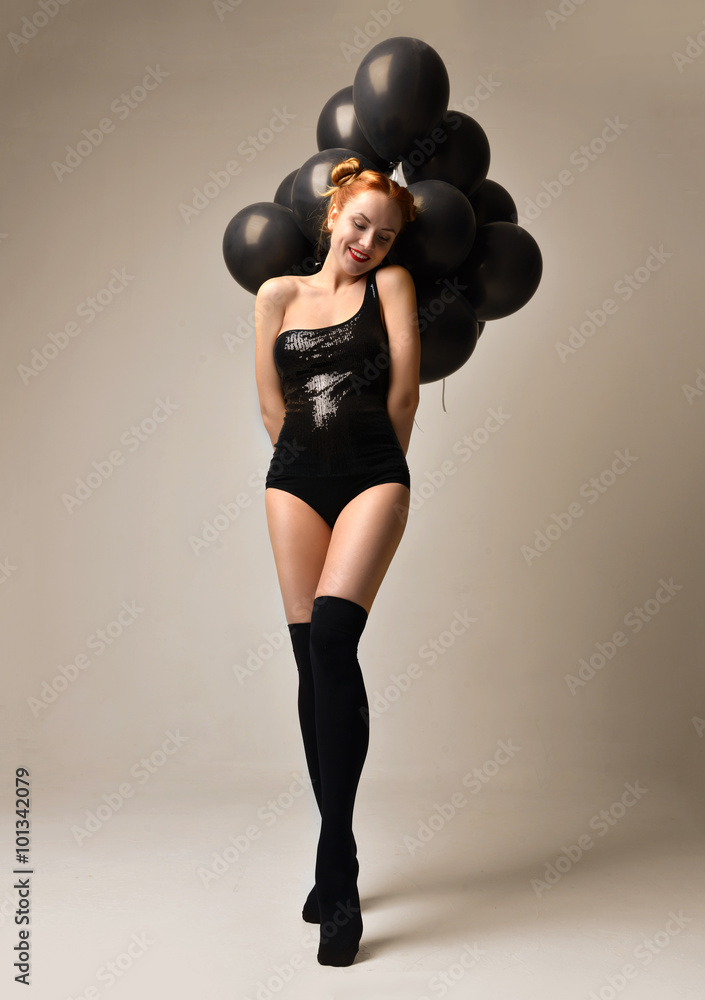 Φωτογραφία Young happy girl with black balloons as a present for birthday p