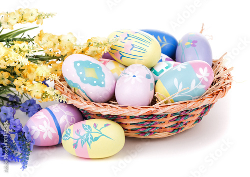 Assortment of Colorful Easter Eggs and Basket