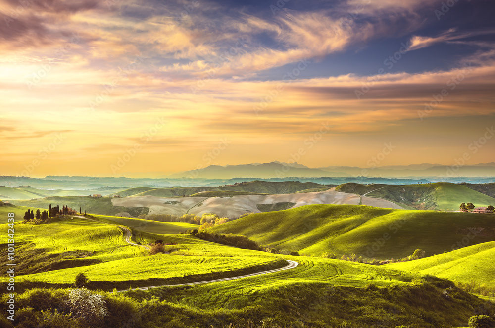 Tuscany spring, rolling hills on sunset. Rural landscape. Italy