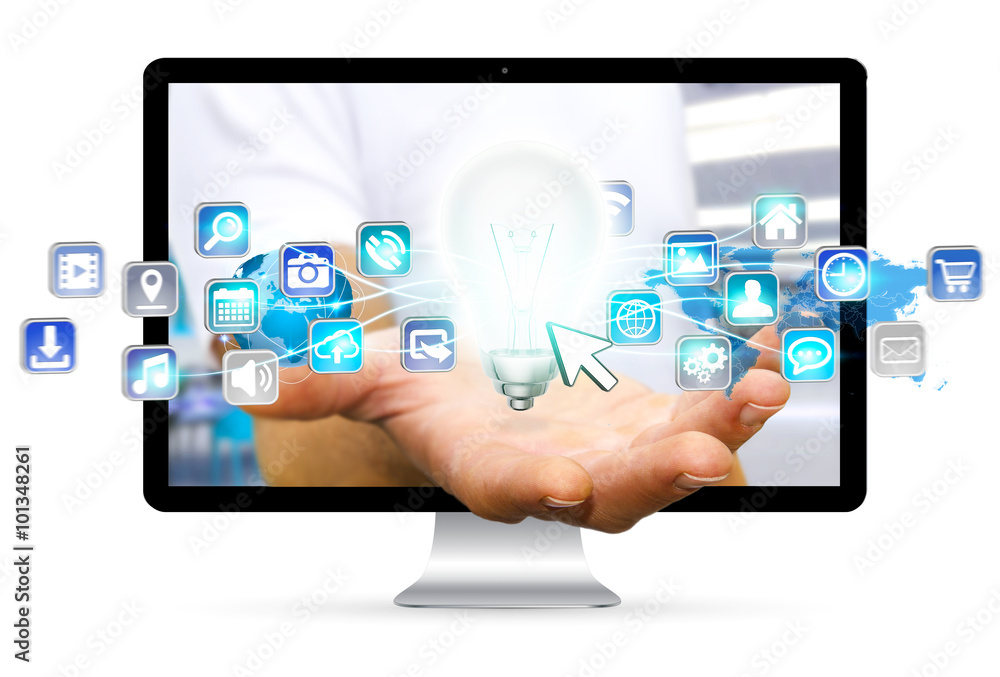 Businessman escaping from computer holding lightbulb and digital Businessman escaping from computer holding lightbulb and digital