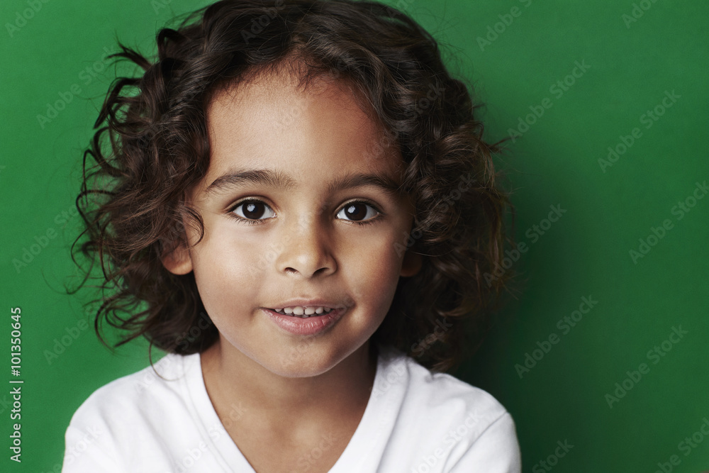 Fototapeta premium Beautiful young boy with brown eyes, portrait