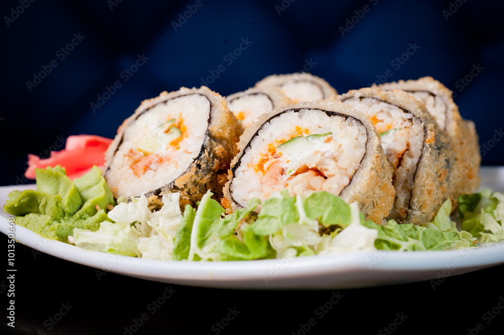 Set of rolls on a wooden dark table. Set of rolls on a wooden dark table.