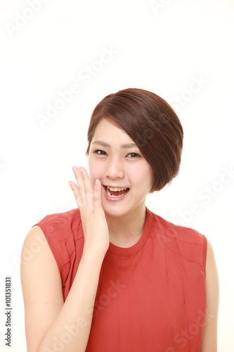 young Japanese woman laughing