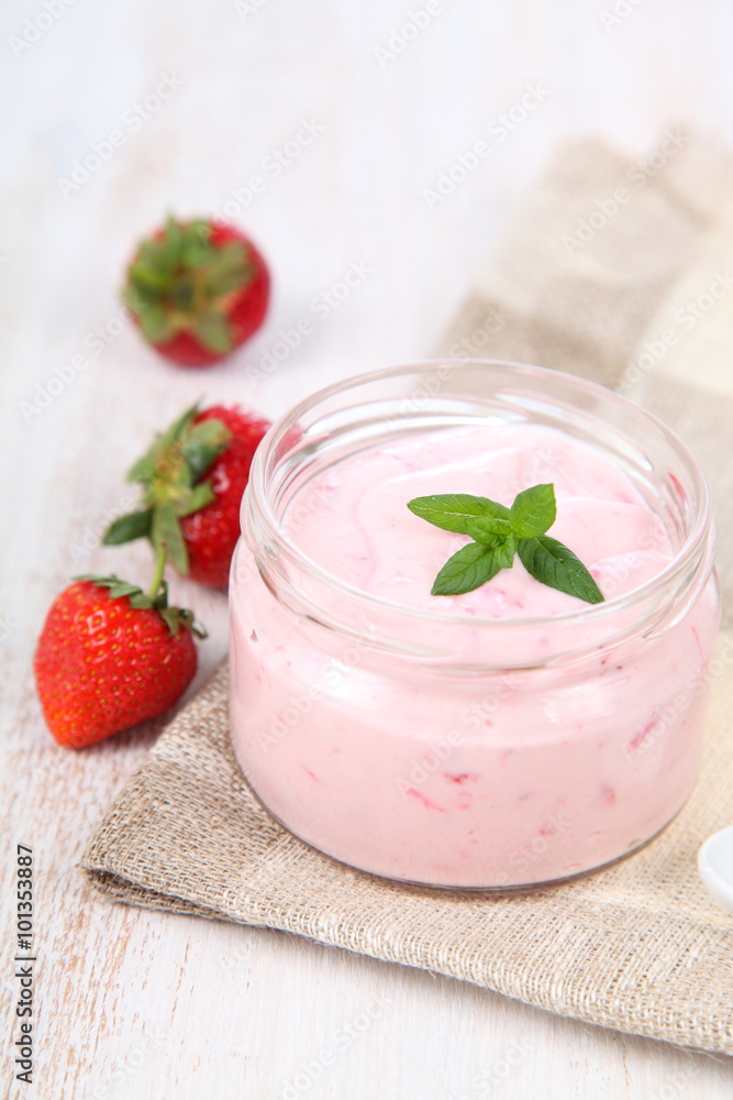 Strawberry yogurt and ripe strawberry Strawberry yogurt and ripe strawberry
