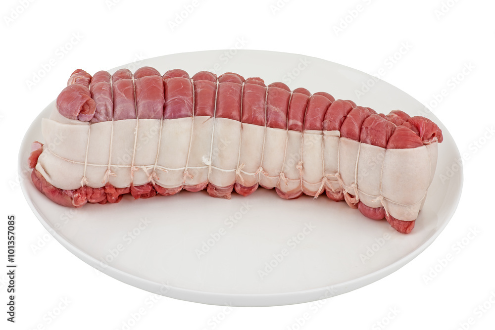 rôti de veau cru roulé et bardé sur plat rôti de veau cru roulé et bardé sur plat