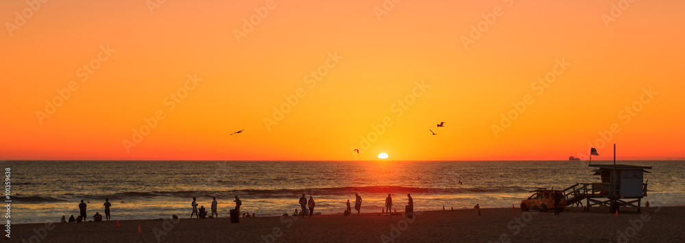 Fototapeta premium Beach at orange sunset, Manhattan Beach, Los Angeles, California