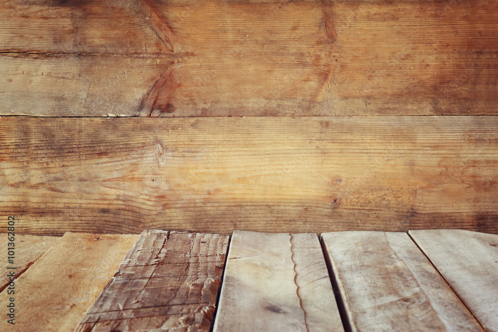 Grunge Vintage Wooden Board Table in Front of Old Wooden