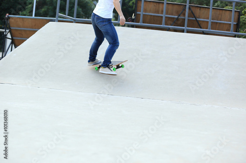 skateboarding legs at skatepark © lzf