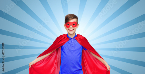 boy in red super hero cape and mask
