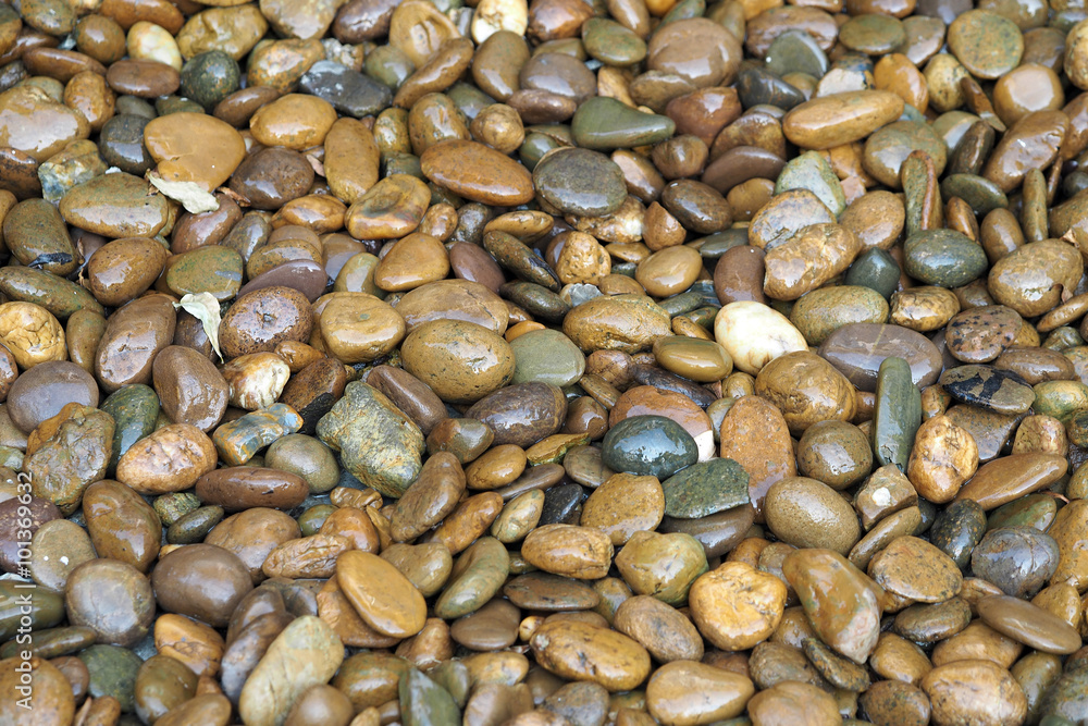 Wet stones pebbles texture background Wet stones pebbles texture background