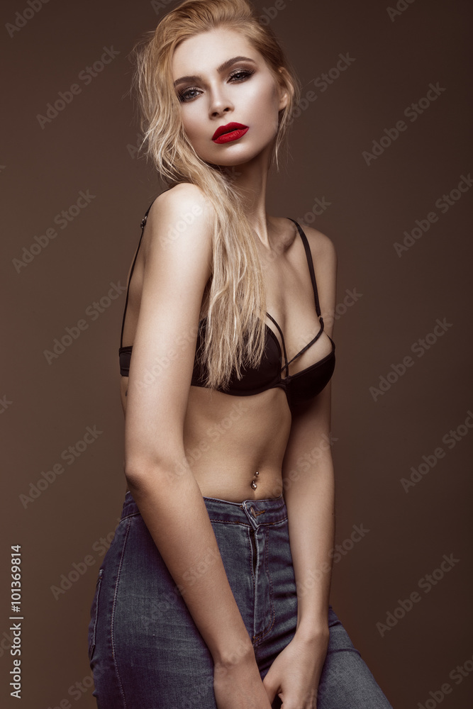 sexy fashion model with long hair, young European attractive, beautiful  eyes, red lips, perfect skin is posing in studio for glamour vogue test  photo shoot showing different poses Stock-Foto | Adobe Stock