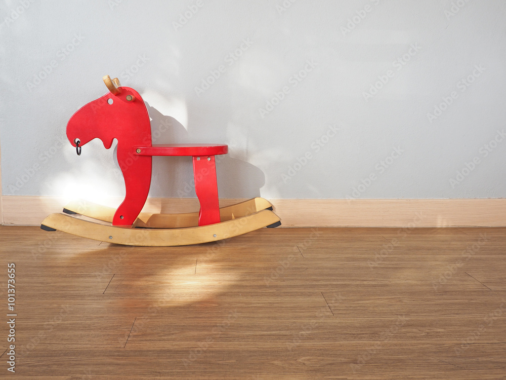Baby rocking horse on wooden floor. Baby rocking horse on wooden floor.