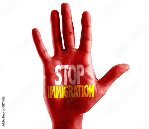 Stop Immigration written on hand isolated on white background photo