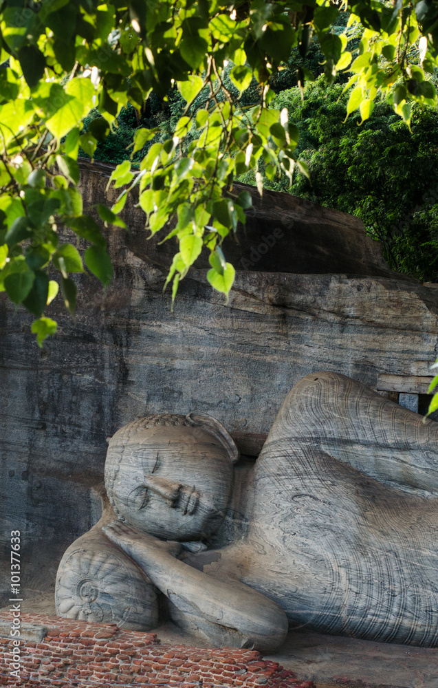 Rock carving of reclining Budddha at polonnaruwa, Sri lanka