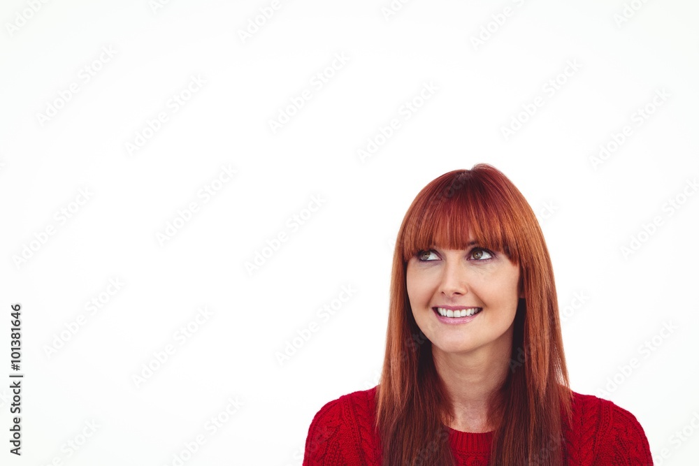 Smiling hipster woman looking above Smiling hipster woman looking above