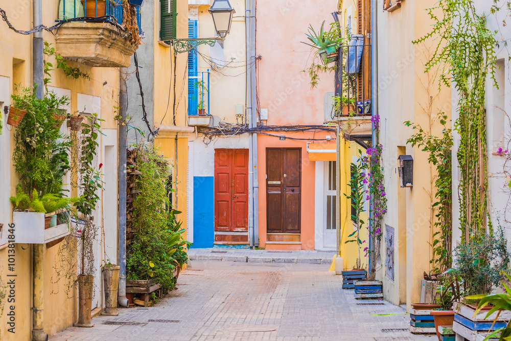 Fototapeta Picturesque view of an mediterranean old town street