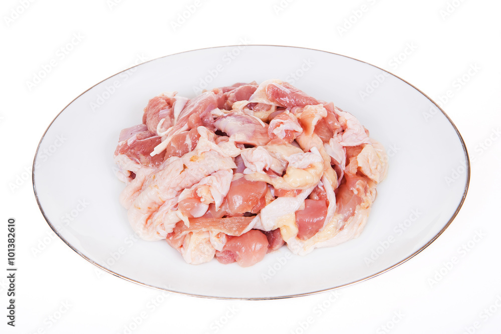 Chicken, cut into pieces on a white background. Chicken, cut into pieces on a white background.