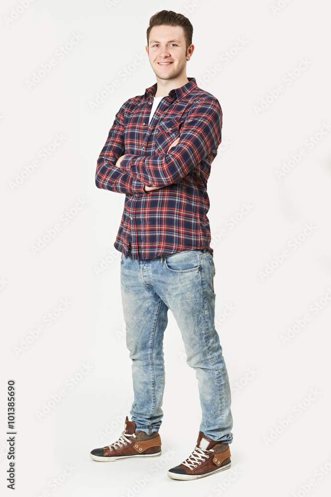 Full Length Portrait Of Man Standing In Studio On White Backgrou Full Length Portrait Of Man Standing In Studio On White Backgrou
