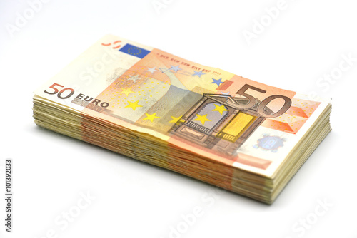 Money pile of 50 Euro banknotes isolated in white