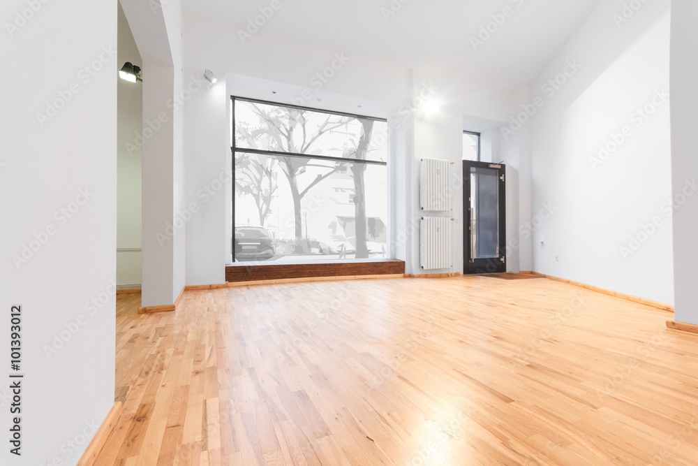 empty room newly renovated - store / shop with wooden floor and empty room newly renovated - store / shop with wooden floor and