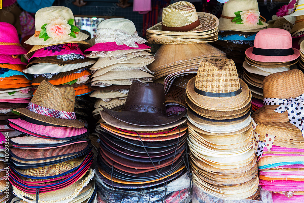 A lot of hats lie on the table
