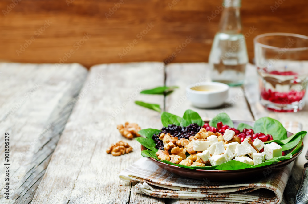 Black rice spinach feta pomegranate walnut salad with orange hon