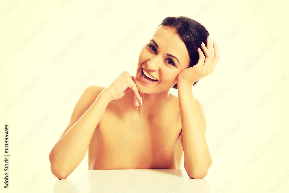Spa woman sitting at the desk Spa woman sitting at the desk