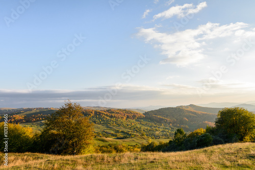 Mountain autumn landscape with colorful forest. Horizontal panor