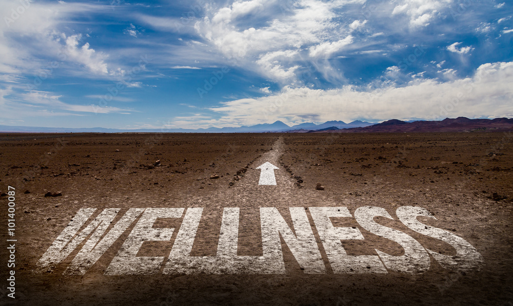 Φωτογραφία Wellness written on desert road