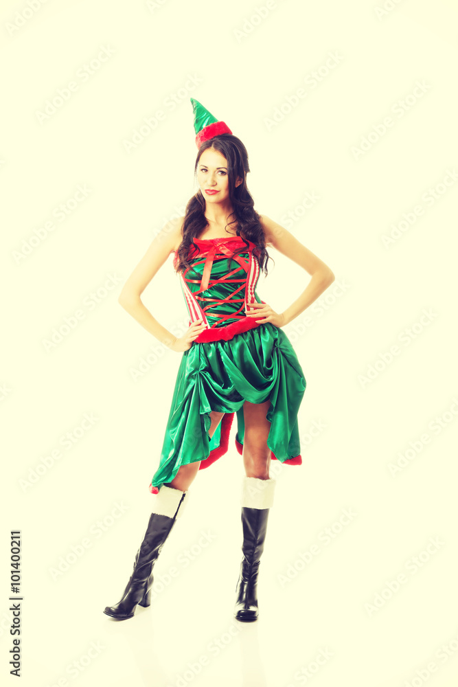 Full length beautiful woman wearing elf clothes, touching her hips Full length beautiful woman wearing elf clothes, touching her hips