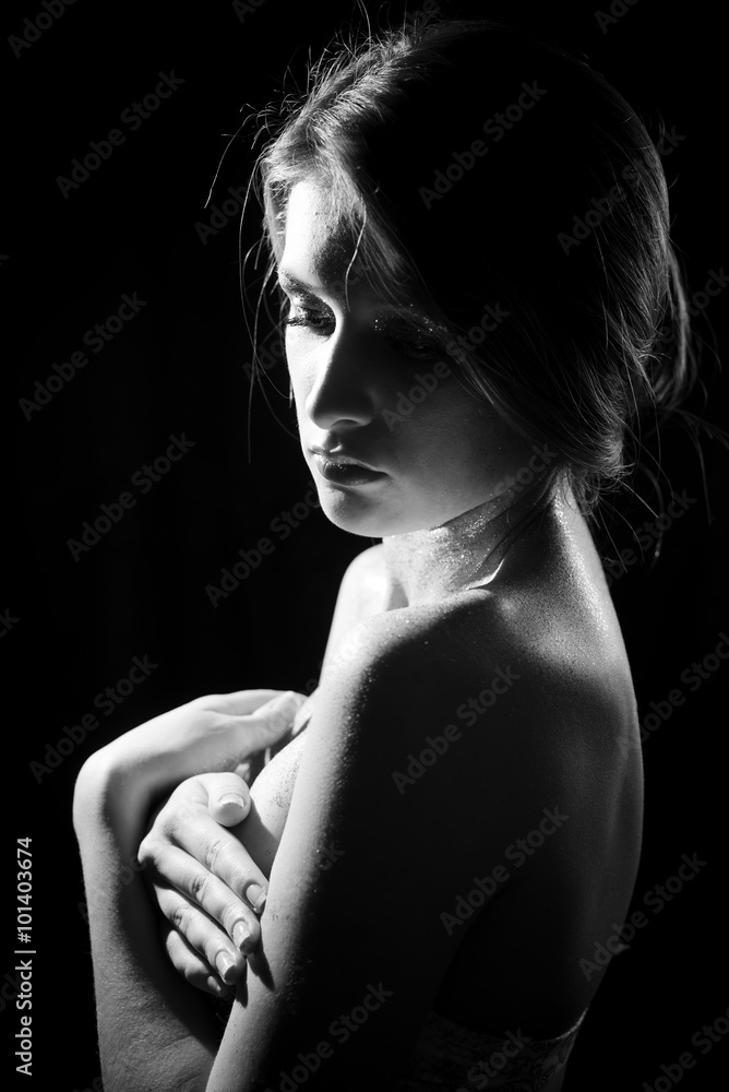 Black and white photography of beautiful female sensually hiding breasts Black and white photography of beautiful female sensually hiding breasts