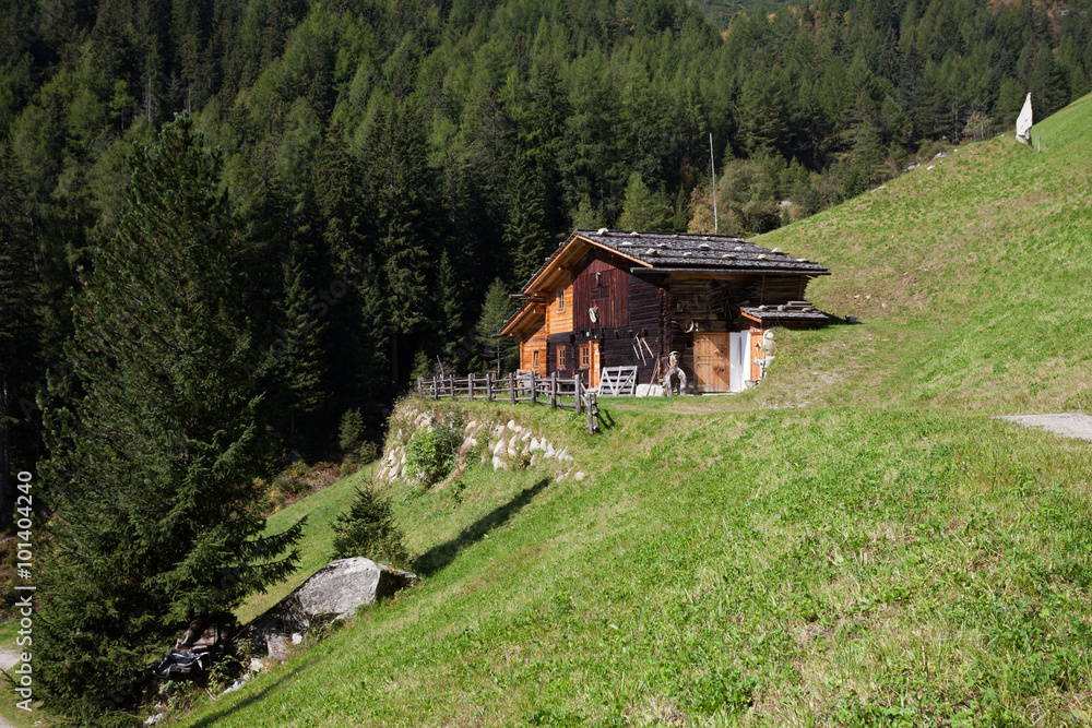 A mountain Italian alm in the valley A mountain Italian alm in the valley