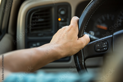 Driver's hands on the steering wheel © lightpoet