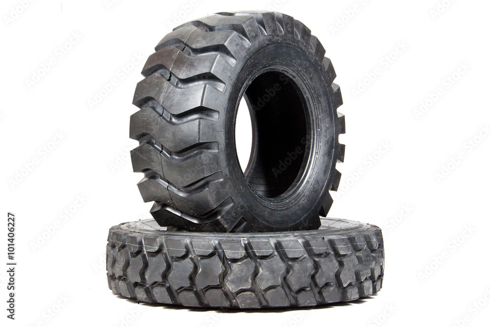 Car tire isolated on white background. Truck tire isolated. Dump Car tire isolated on white background. Truck tire isolated. Dump
