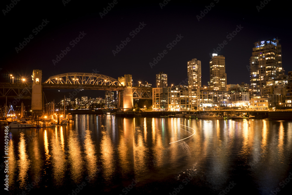 Granville Island view of Vancouver's Burrard  Bridge and Buildings at Night