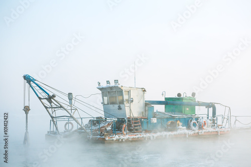 Canvas Print funny boat in the fog