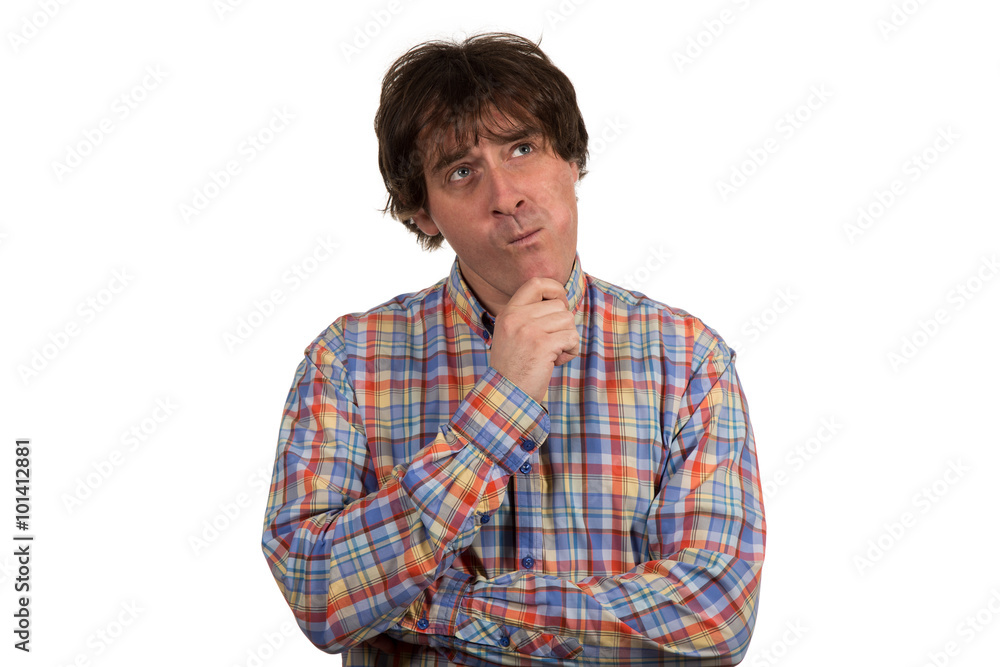 Closeup portrait of pensive young man in checkered shirt. Closeup portrait of pensive young man in checkered shirt.