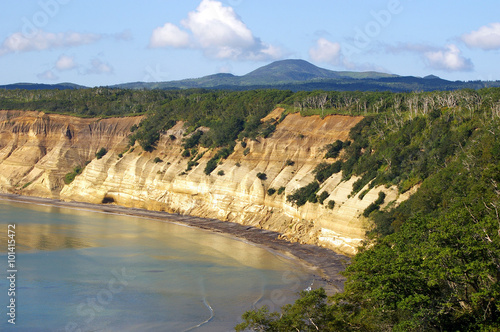 Bay on seaside of the island Kunashir. Kuriles,Russia, Pacific ocean  photo