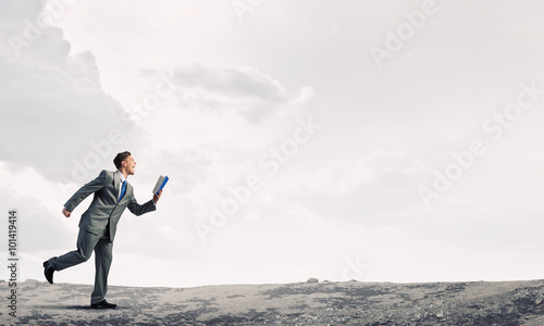 Man reading on the run