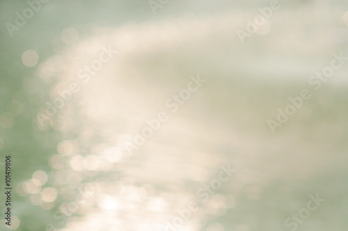 de focus water reflect sun light surface background