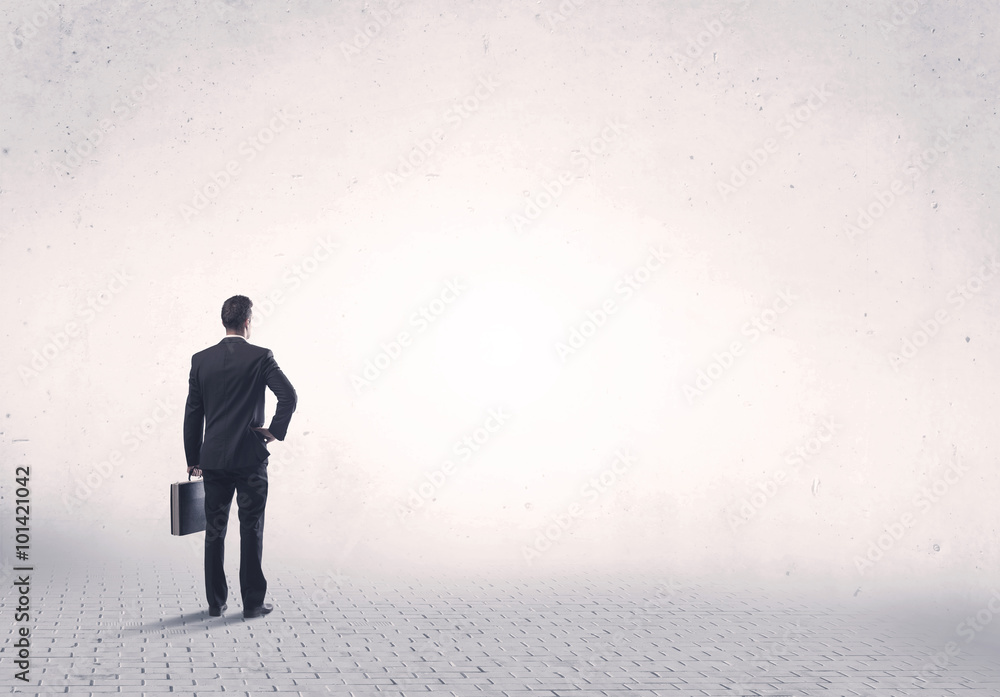 Elegant person standing with his back Elegant person standing with his back