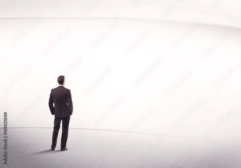 Businessman with briefcase standing still Businessman with briefcase standing still