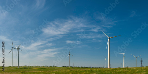 Windmills on field