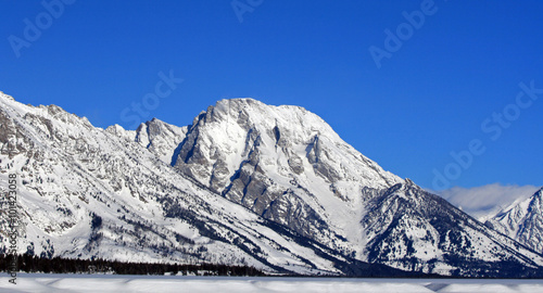 Mount Moran (12,605 ft) in Grand Tetons range of the Central Rocky Mountains in Grand Tetons National Park in Bridger-Tetons National Forest in Wyoming USA near the town of Jackson Hole during winter