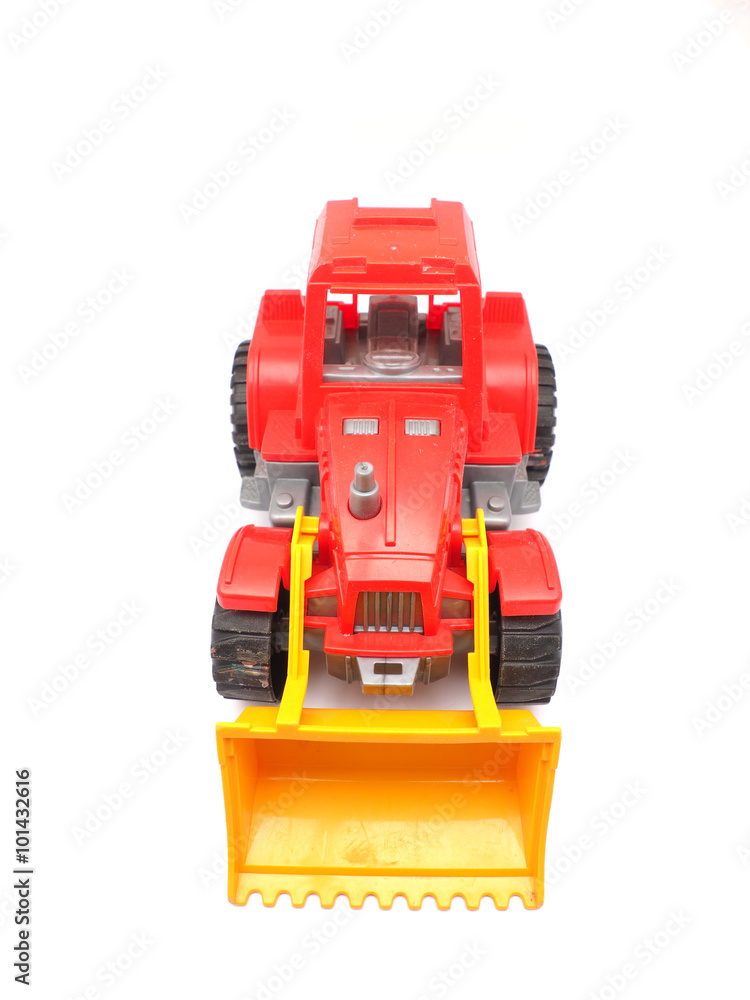 toy tractor on a white background toy tractor on a white background