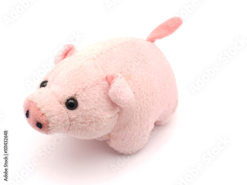 soft toy pig on a white background © enskanto