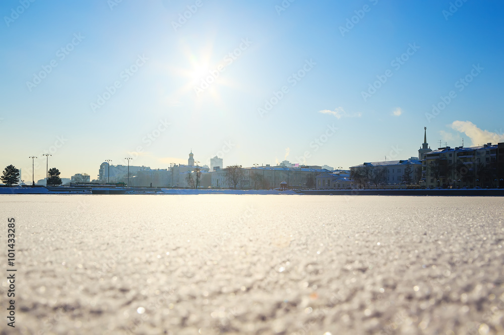 Fototapeta premium View of quay wharf embankment Yekaterinburg City. Winter. Sun