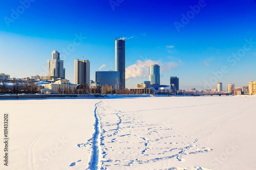 View of quay wharf embankment Yekaterinburg City. Winter. Sun © vladimircaribb